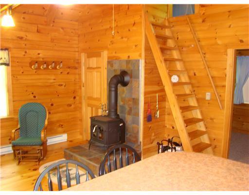 52 City Road Madrid Township, ME 04966 - Photo 3 of 7 Living Room. Main level offers...