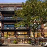 a front view of a building with street view