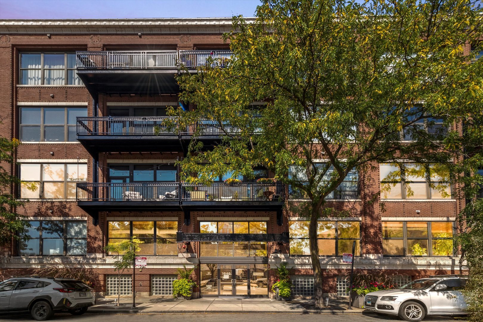 a front view of a building with street view
