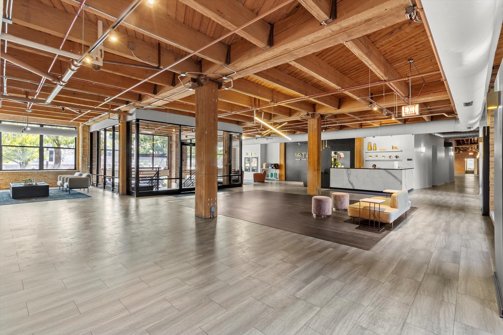 Undisclosed Address Chicago, IL 60607 - Photo 19 of 34 a view of a hall with wooden floors