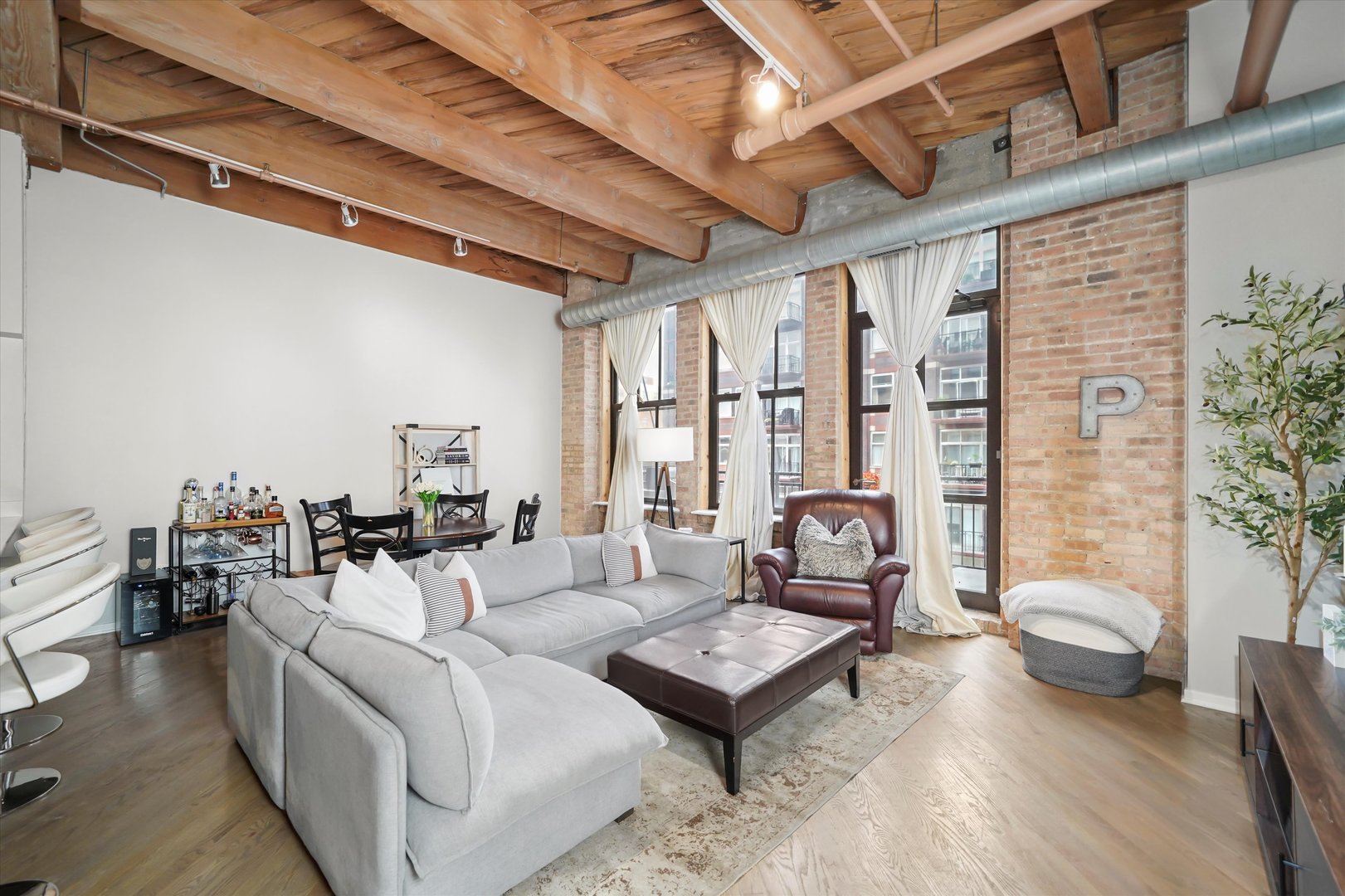 Undisclosed Address Chicago, IL 60607 - Photo 4 of 34 a living room with furniture and a floor to ceiling window
