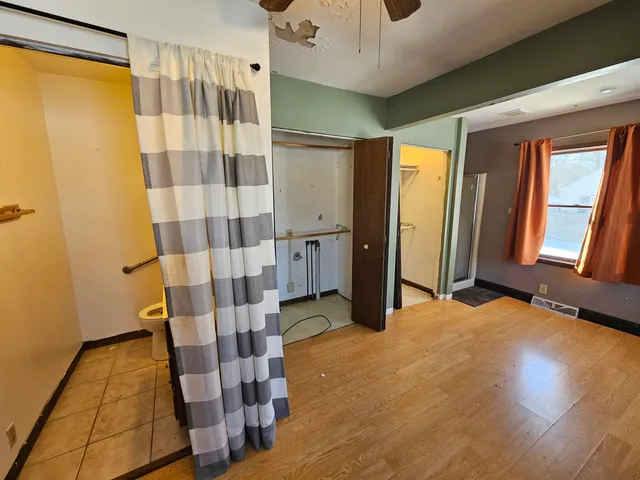 a bathroom with a sink and shower
