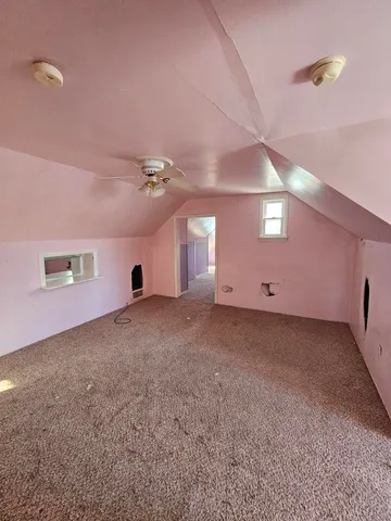 a view of a livingroom and a window