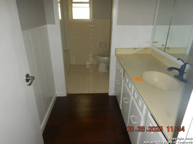 a bathroom with a sink and a shower