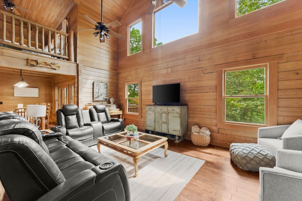 994 Whispering Hill Drive Cherry Log, GA 30522 - Photo 11 of 74 a outdoor space with patio the couches and a potted plant on a coffee table
