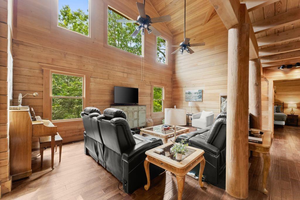994 Whispering Hill Drive Cherry Log, GA 30522 - Photo 12 of 74 a living room with furniture and a fireplace