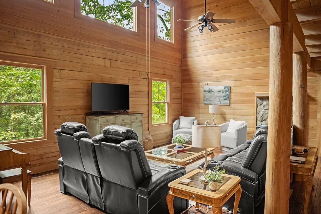 994 Whispering Hill Drive Cherry Log, GA 30522 - Photo 13 of 74 a living room with furniture and a flat screen tv