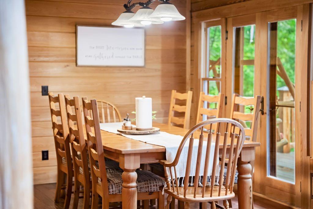 994 Whispering Hill Drive Cherry Log, GA 30522 - Photo 25 of 74 a view of a dining room with furniture and wooden floor