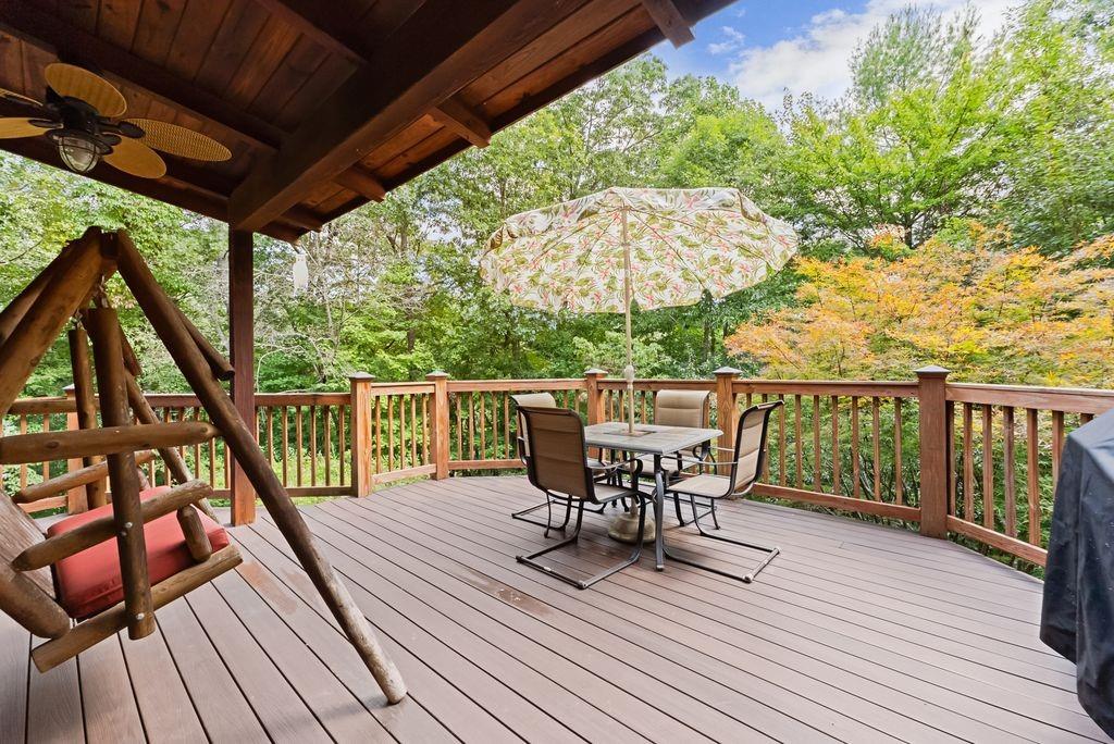 994 Whispering Hill Drive Cherry Log, GA 30522 - Photo 27 of 74 a view of a balcony with furniture and wooden floor