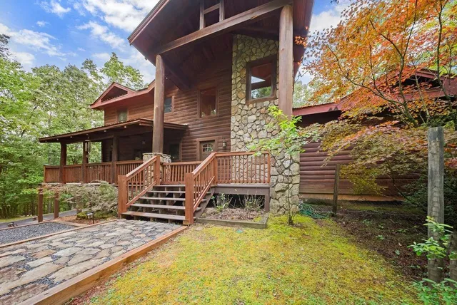 a view of a balcony with wooden floor
