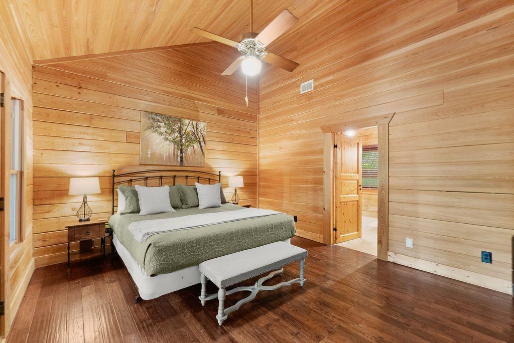 994 Whispering Hill Drive Cherry Log, GA 30522 - Photo 33 of 74 a bedroom with a bed and a table