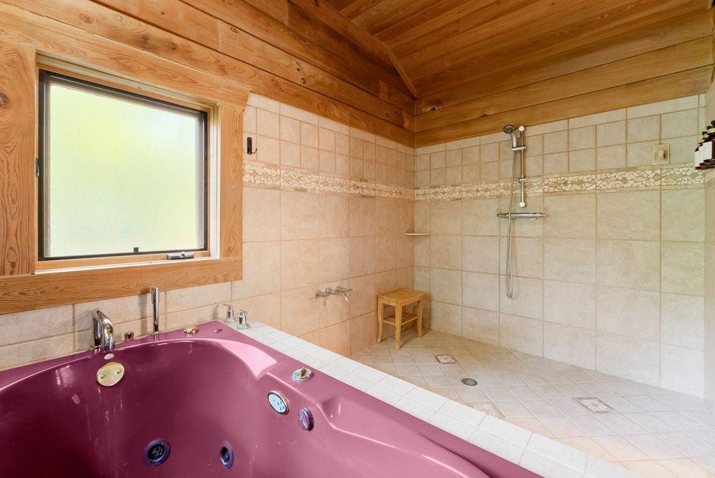 994 Whispering Hill Drive Cherry Log, GA 30522 - Photo 37 of 74 a bathroom with a sink and a bathtub