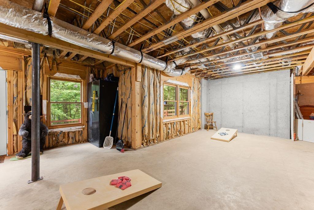 994 Whispering Hill Drive Cherry Log, GA 30522 - Photo 55 of 74 a bed room with a bed and a window