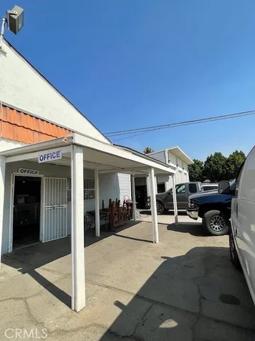 a view of a building with sitting area