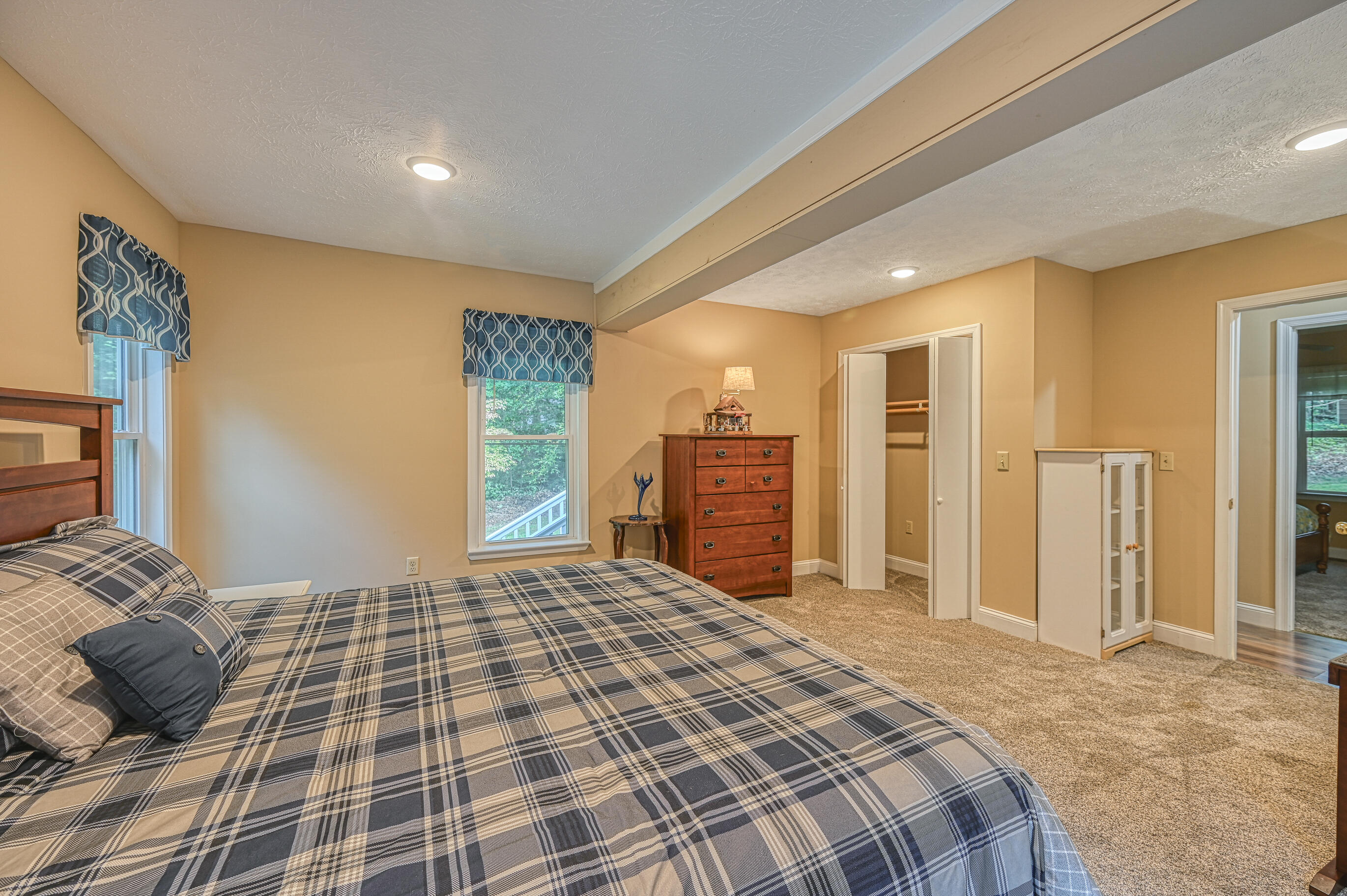 206 Oak Road Bumpass, VA 23024 - Photo 14 of 38 a bedroom with a bed and a television