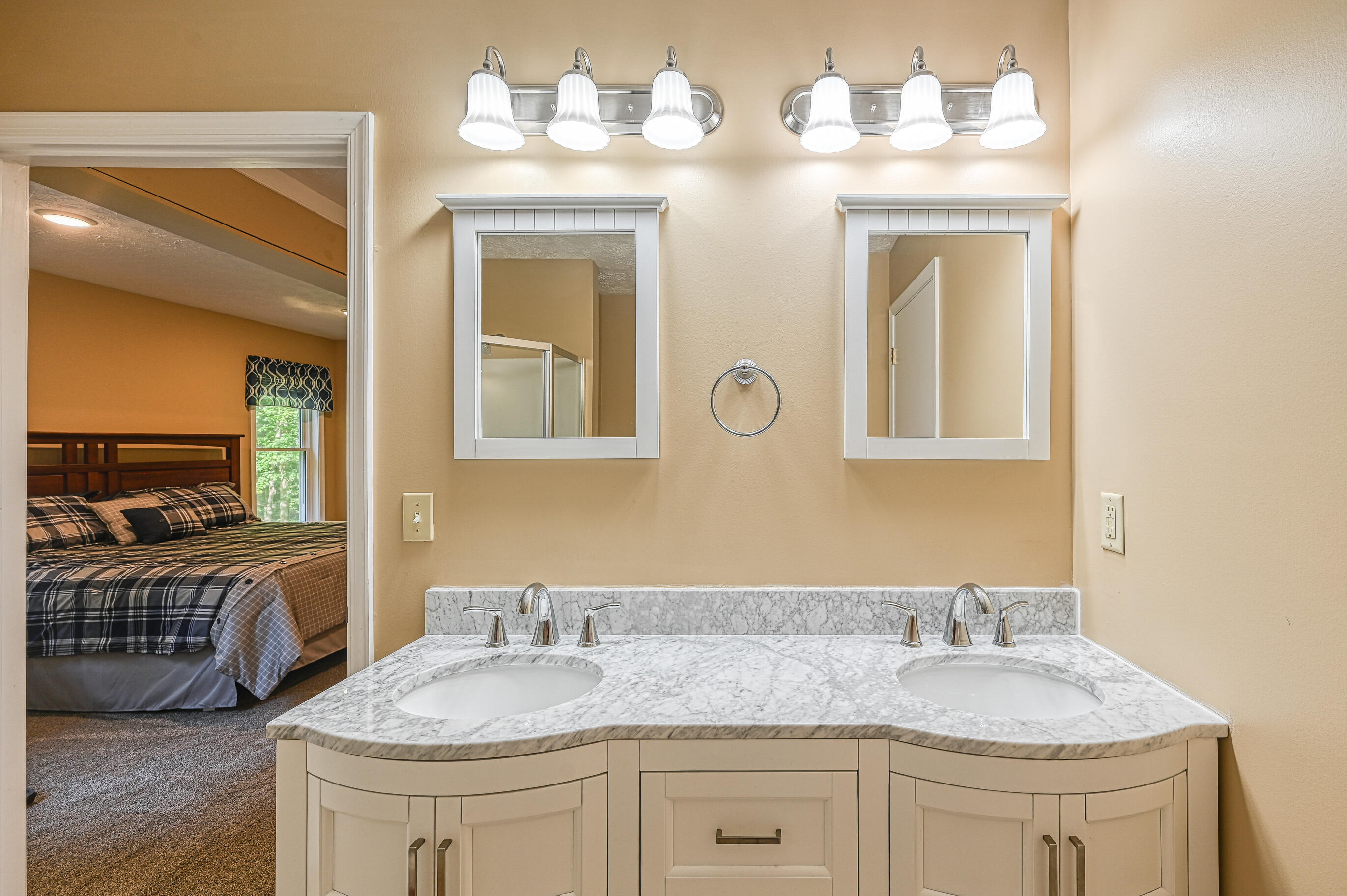 206 Oak Road Bumpass, VA 23024 - Photo 16 of 38 a bathroom with a granite countertop double vanity sink and a mirror