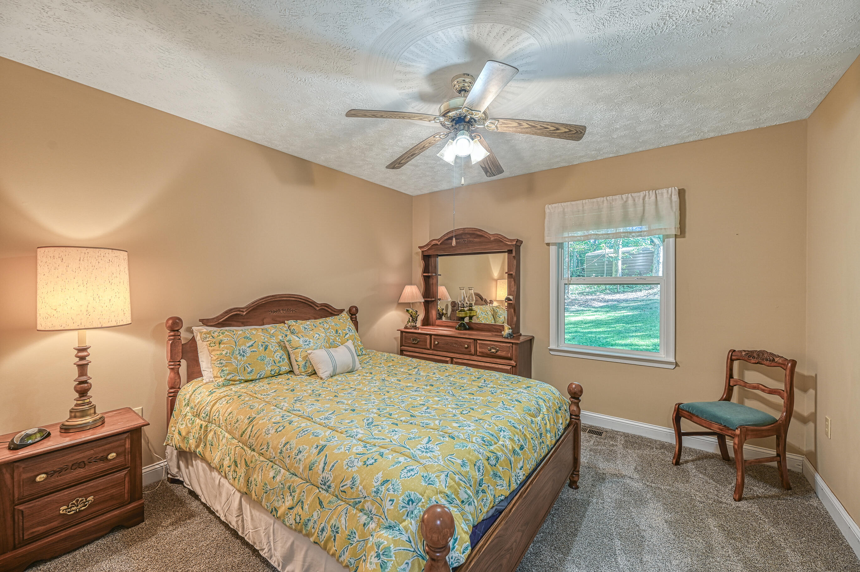 206 Oak Road Bumpass, VA 23024 - Photo 19 of 38 a bedroom with a bed and a window