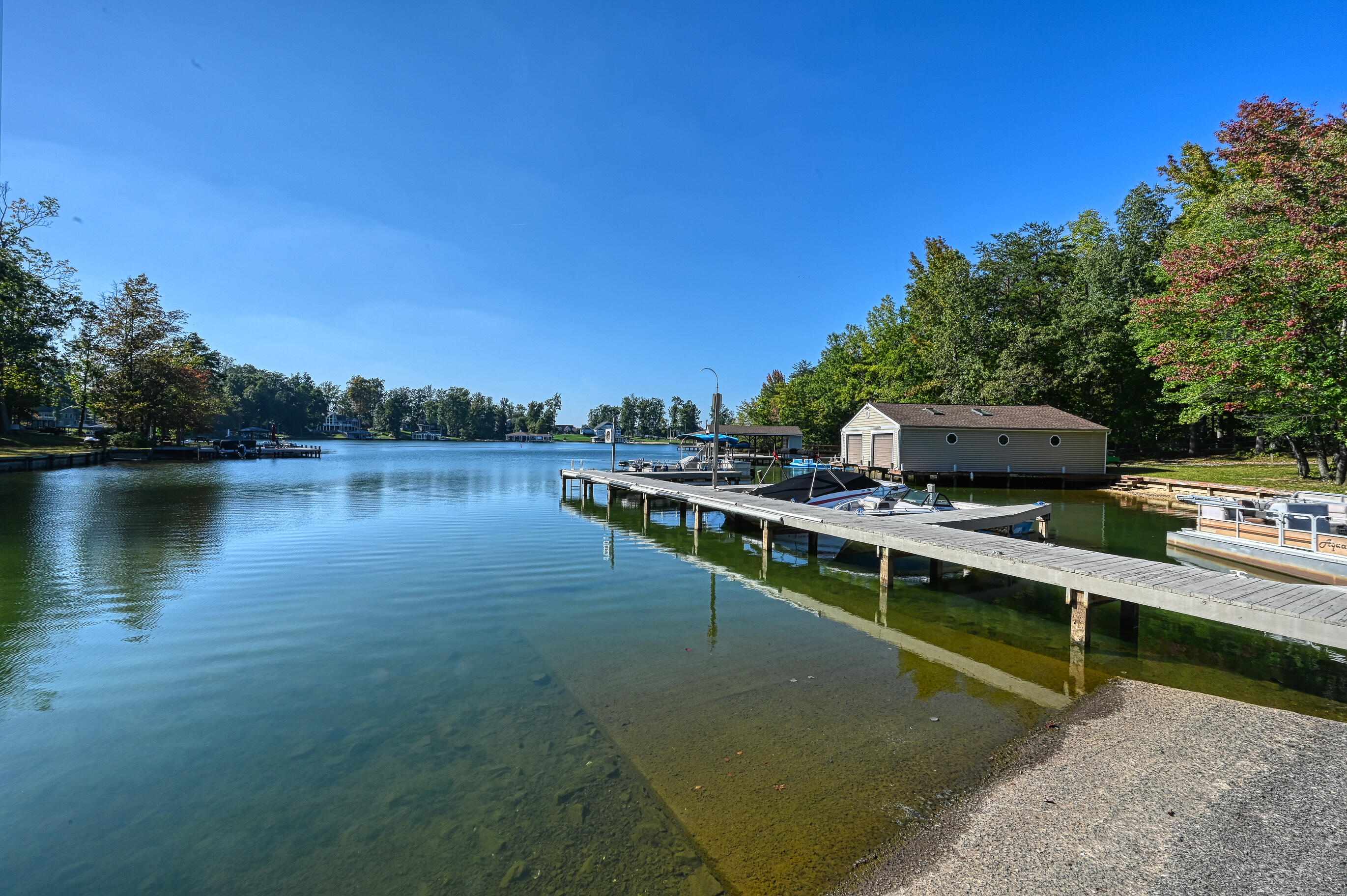 206 Oak Road Bumpass, VA 23024 - Photo 35 of 38 a view of a lake with houses in the back