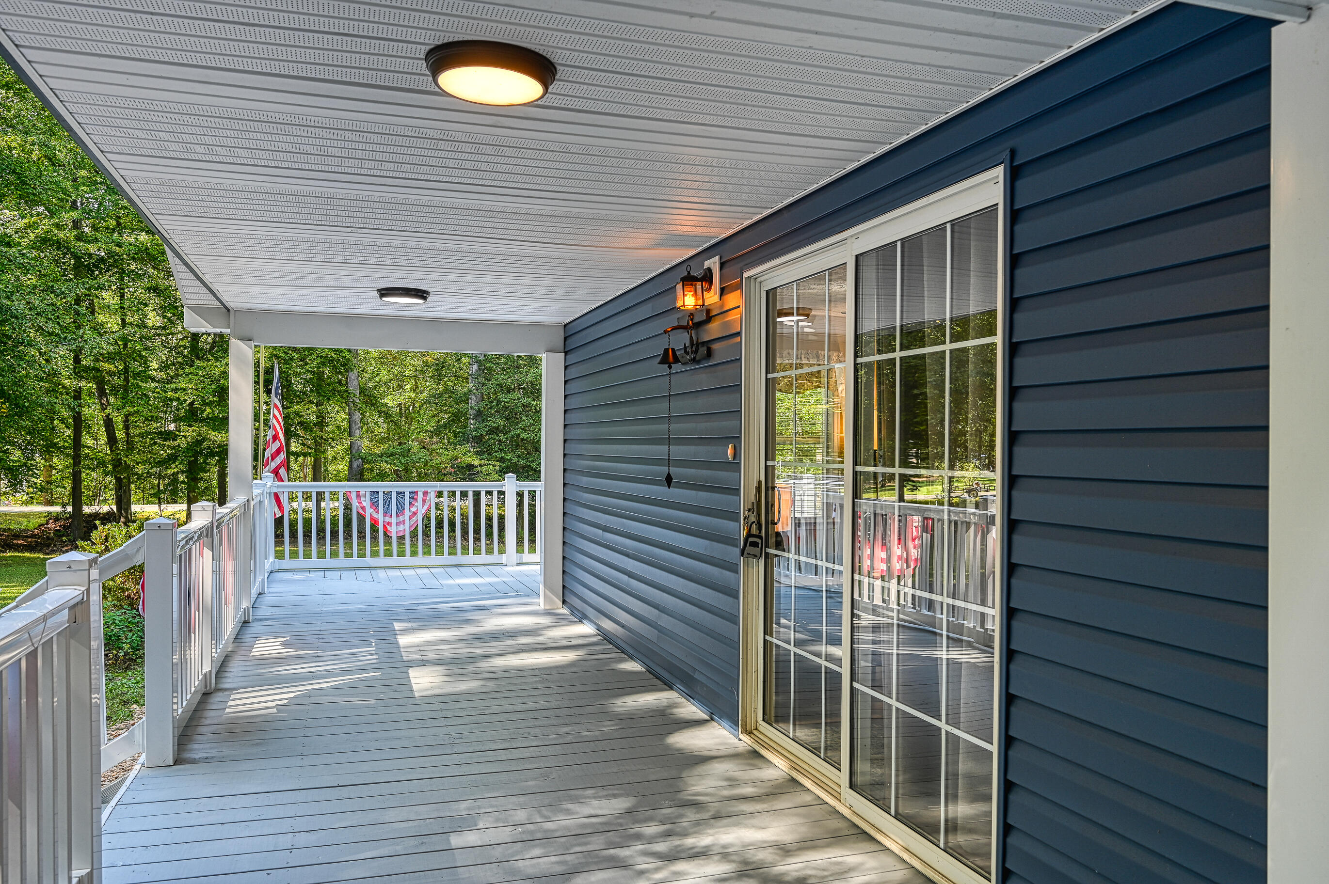 206 Oak Road Bumpass, VA 23024 - Photo 4 of 38 a view of a porch with wooden floor