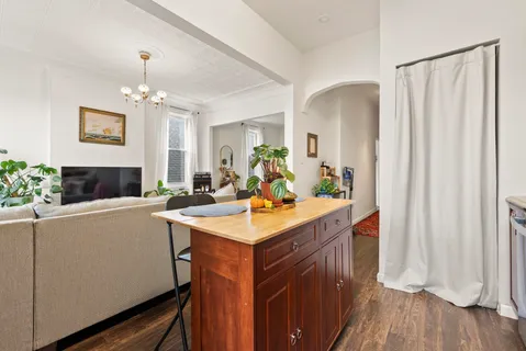 a kitchen with a sink and cabinets