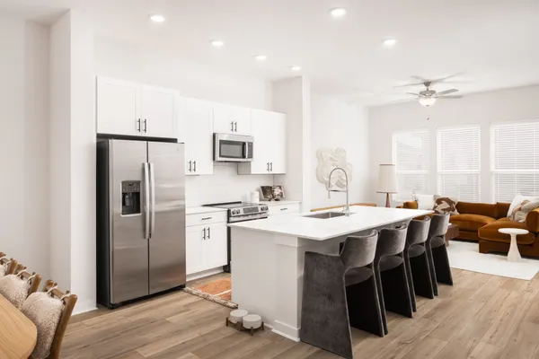 a picture of a bench in front of a window