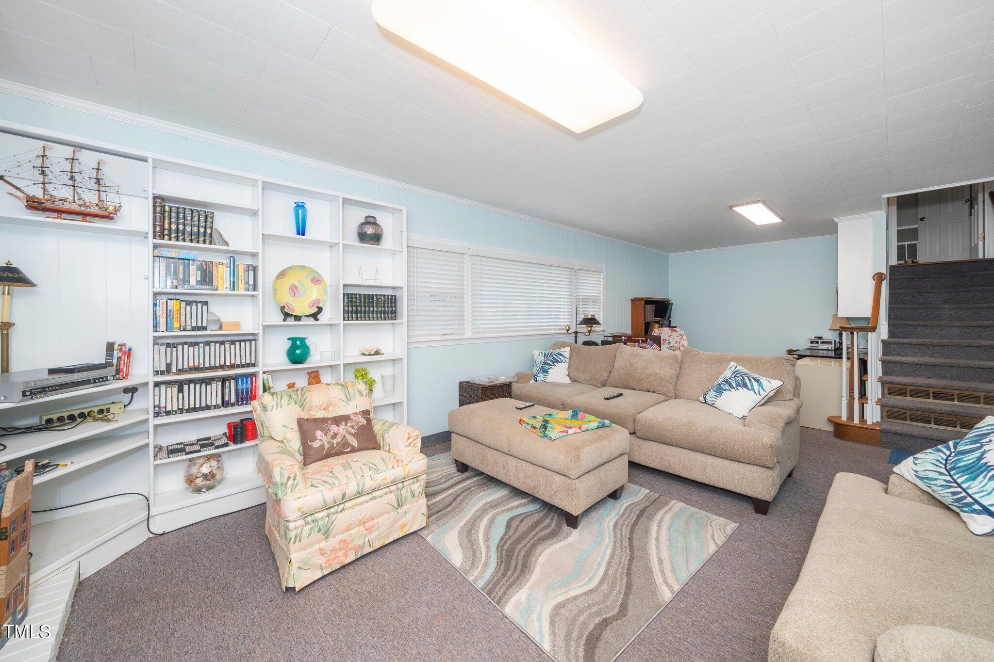 1312 Hampton Valley Road, Unit 10 Cary, NC 27511 - Photo 20 of 35 lower level toward the stairs