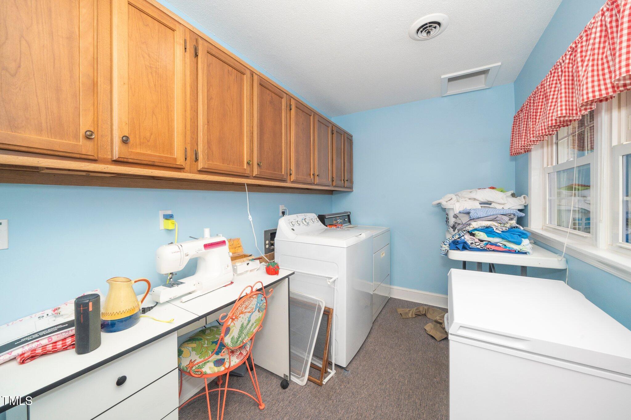1312 Hampton Valley Road, Unit 10 Cary, NC 27511 - Photo 24 of 35 Laundry room