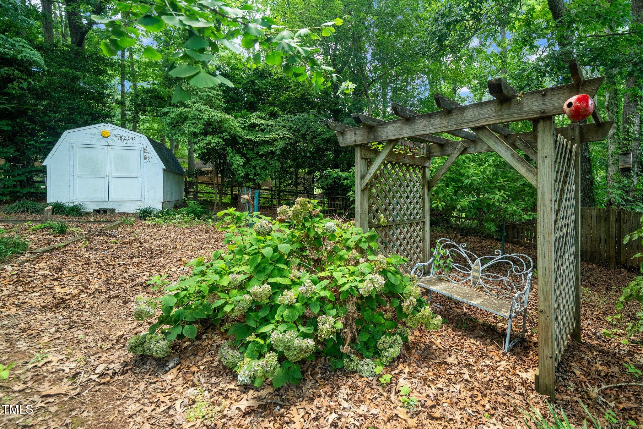 1312 Hampton Valley Road, Unit 10 Cary, NC 27511 - Photo 30 of 35 shed and arbor