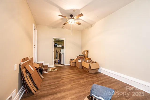 a room with furniture and wooden floor