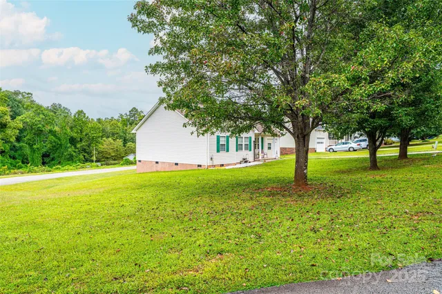 a house view with garden space