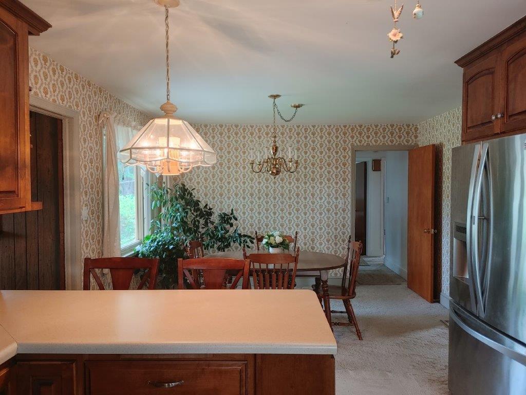 3245 Riner Road Christiansburg, VA 24073 - Photo 15 of 31 a kitchen with a table and chairs