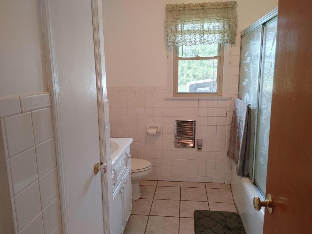 3245 Riner Road Christiansburg, VA 24073 - Photo 20 of 31 a bathroom with a toilet and a shower