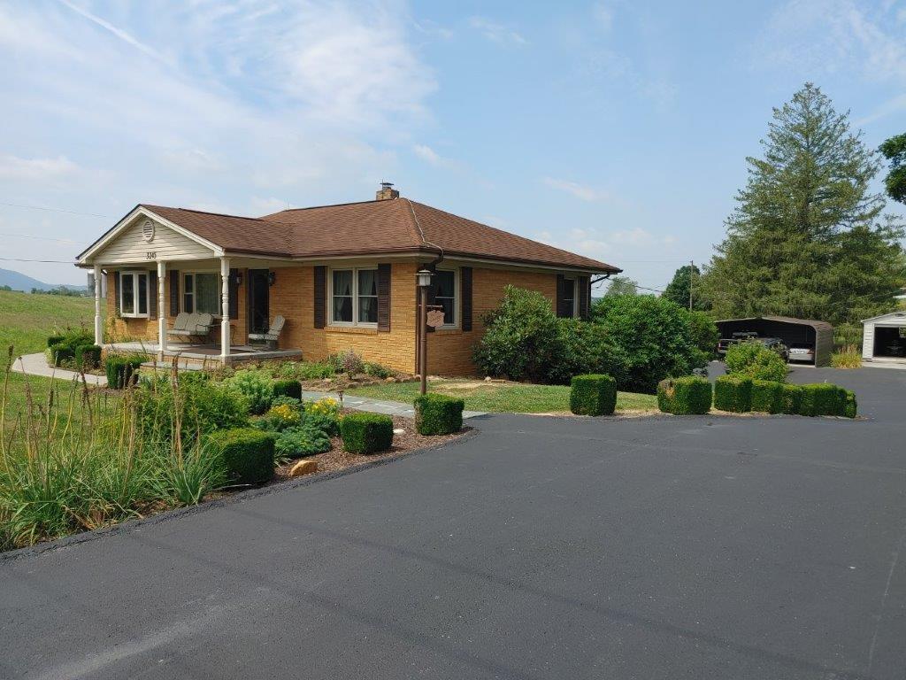 3245 Riner Road Christiansburg, VA 24073 - Photo 31 of 31 a front view of a house with a yard and garage