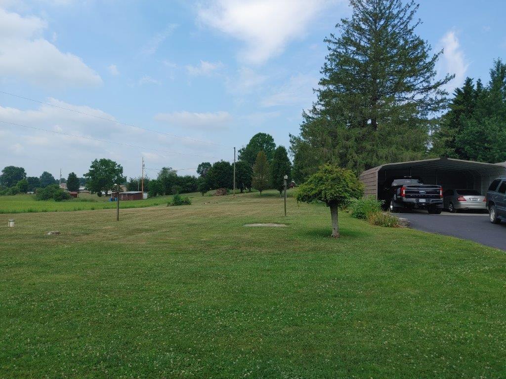 3245 Riner Road Christiansburg, VA 24073 - Photo 7 of 31 a house view with a play ground in front of it
