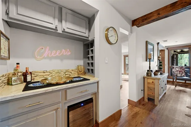 a kitchen with stainless steel appliances granite countertop a stove and cabinets