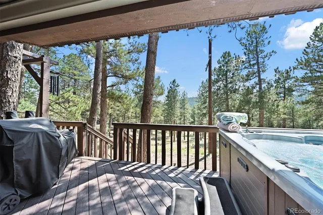 a view of balcony with furniture