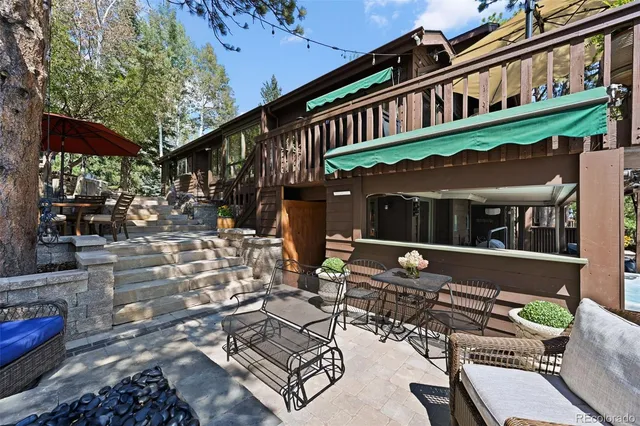 a view of a building with sitting area