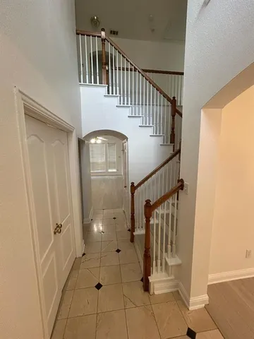 a view of an entryway with staircase