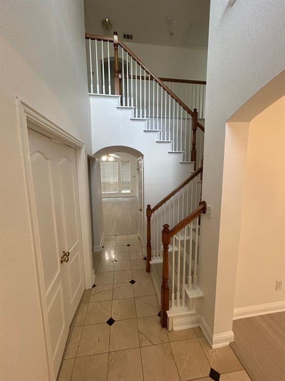 588 Southridge Way Irving, TX 75063 - Photo 5 of 26 a view of an entryway with staircase