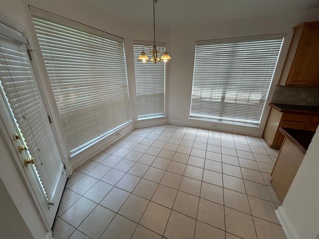 588 Southridge Way Irving, TX 75063 - Photo 10 of 26 a view of an empty room with a window