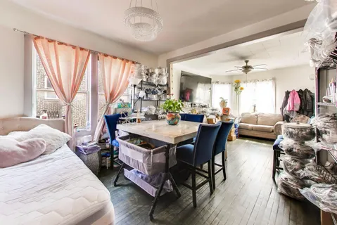 a kitchen with stainless steel appliances granite countertop a sink and a refrigerator
