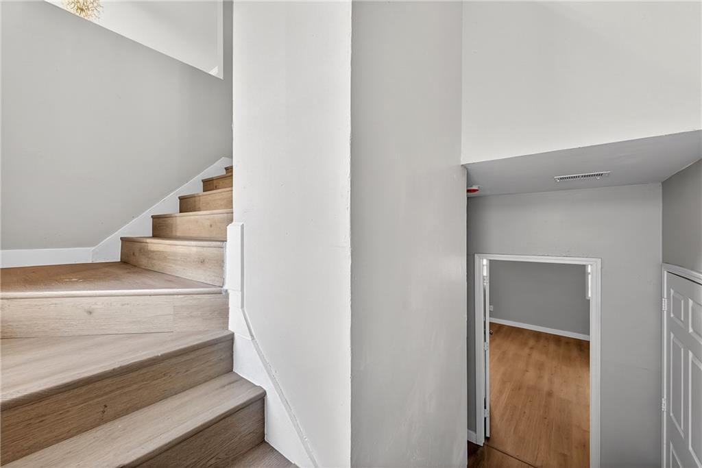 2874 Fairburn Road Southwest Atlanta, GA 30331 - Photo 4 of 34 a view of staircase with white walls