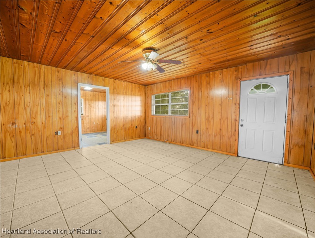 657 North Hollandtown Road Wauchula, FL 33873 - Photo 18 of 25 a view of an empty room with windows