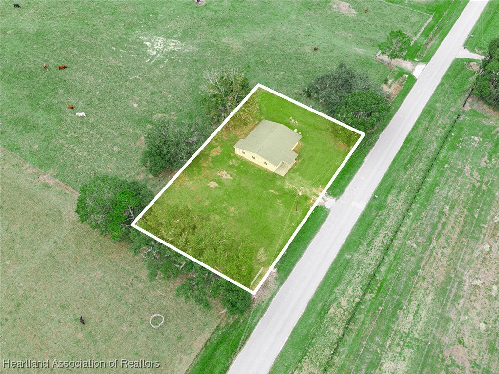 657 North Hollandtown Road Wauchula, FL 33873 - Photo 21 of 25 a view of a tennis court