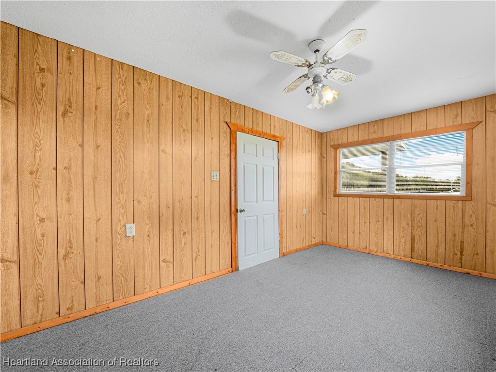 657 North Hollandtown Road Wauchula, FL 33873 - Photo 6 of 25 a view of an empty room with a window