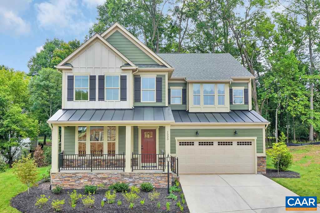 1617 Fowler Ridge Court Charlottesville, VA 22901 - Photo 1 of 23 a front view of a house with a yard and trees