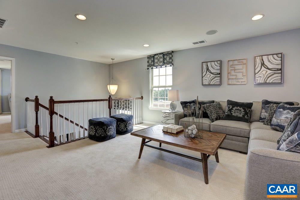 1617 Fowler Ridge Court Charlottesville, VA 22901 - Photo 14 of 23 a living room with furniture and a lamp