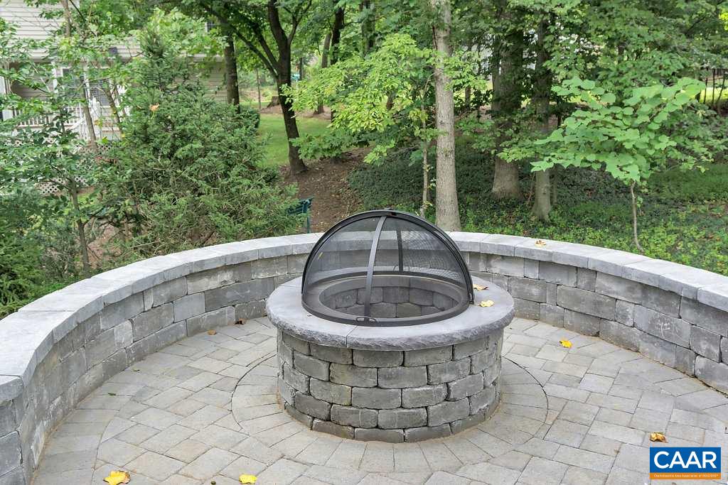 1617 Fowler Ridge Court Charlottesville, VA 22901 - Photo 23 of 23 a view of a fountain with a bench in the background