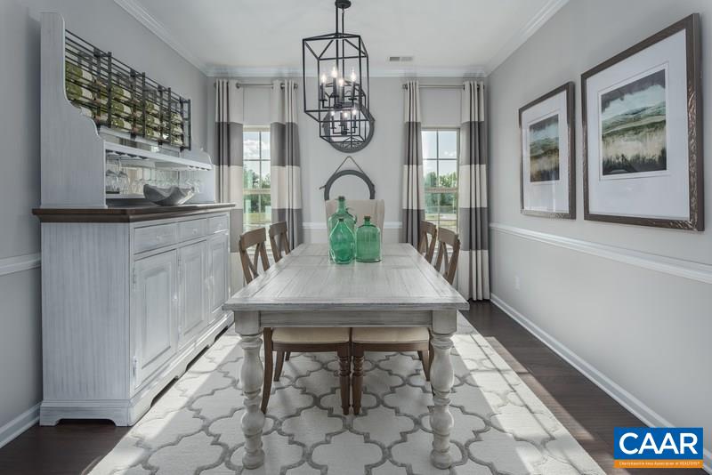 1617 Fowler Ridge Court Charlottesville, VA 22901 - Photo 10 of 23 a dining room with wooden floor and chandelier