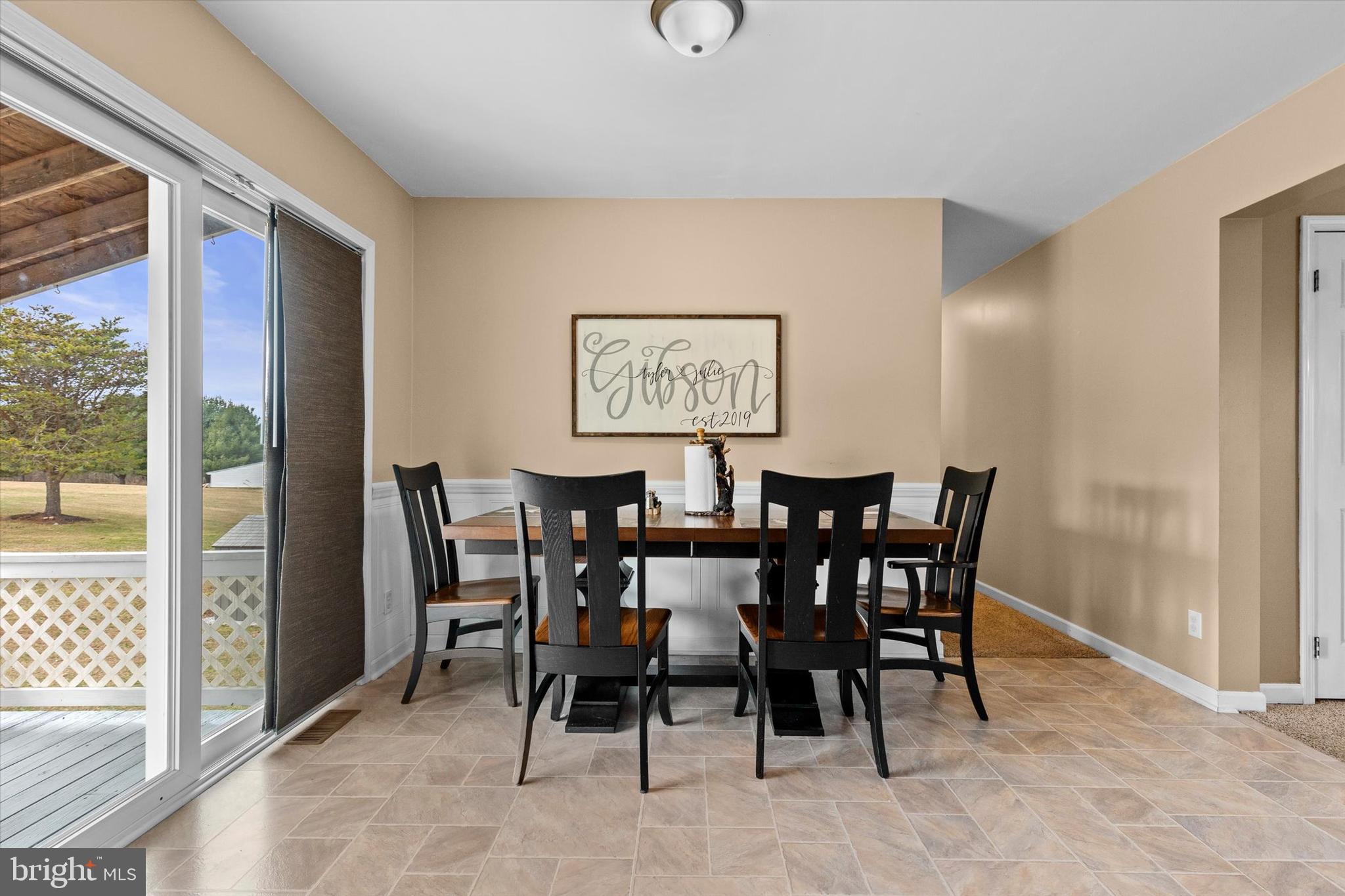 635 Newport Road Duncannon, PA 17020 - Photo 12 of 55 a view of a dining room with furniture and a potted plant
